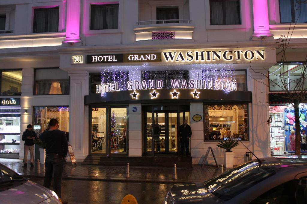 Grand Washington Hotel - a store front of a building with lights on it at Grand Washington Hotel in Istanbul