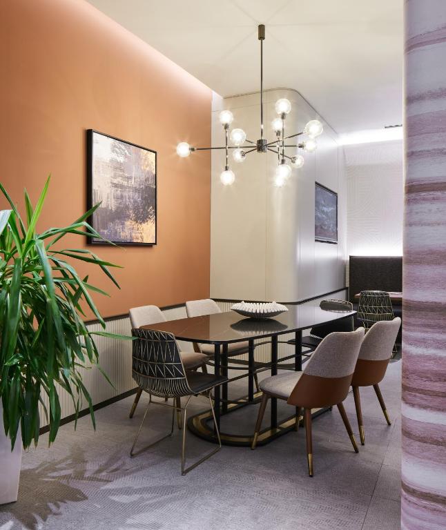 Lamartine Hotel - a dining room with a table and chairs at Lamartine Hotel in Istanbul
