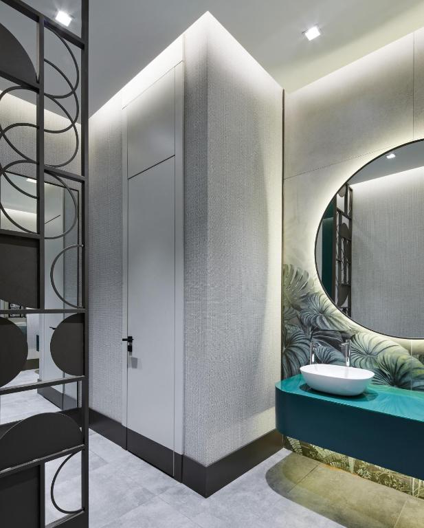 Lamartine Hotel - a bathroom with a sink and a mirror at Lamartine Hotel in Istanbul