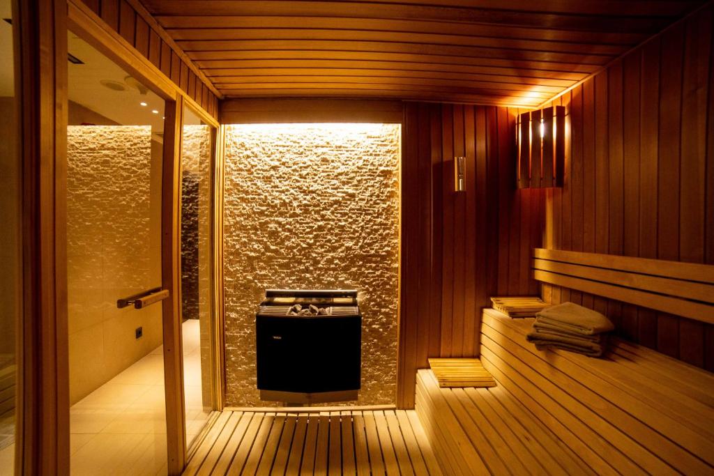 Lasagrada Hotel Istanbul - a room with a sauna with a heater in it at Lasagrada Hotel Istanbul in Istanbul