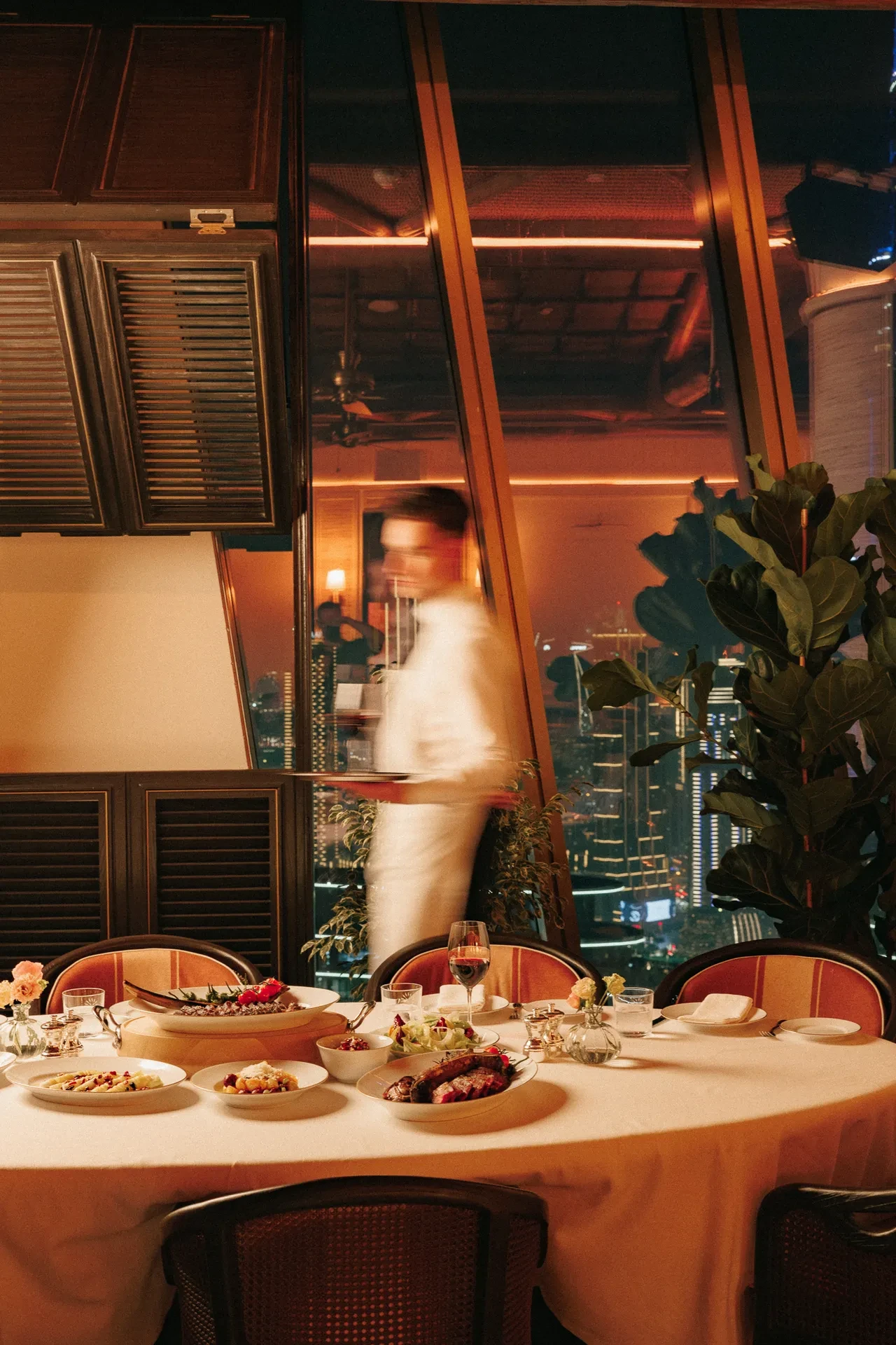 Elegant dining setup at Lion in the Sun Dubai venue.