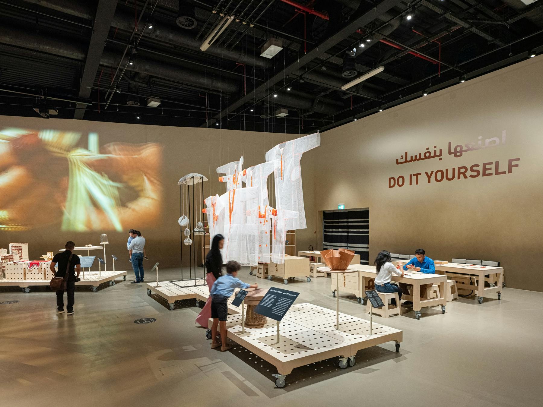 House of Artisans interior, interactive displays, Dubai exhibition space.