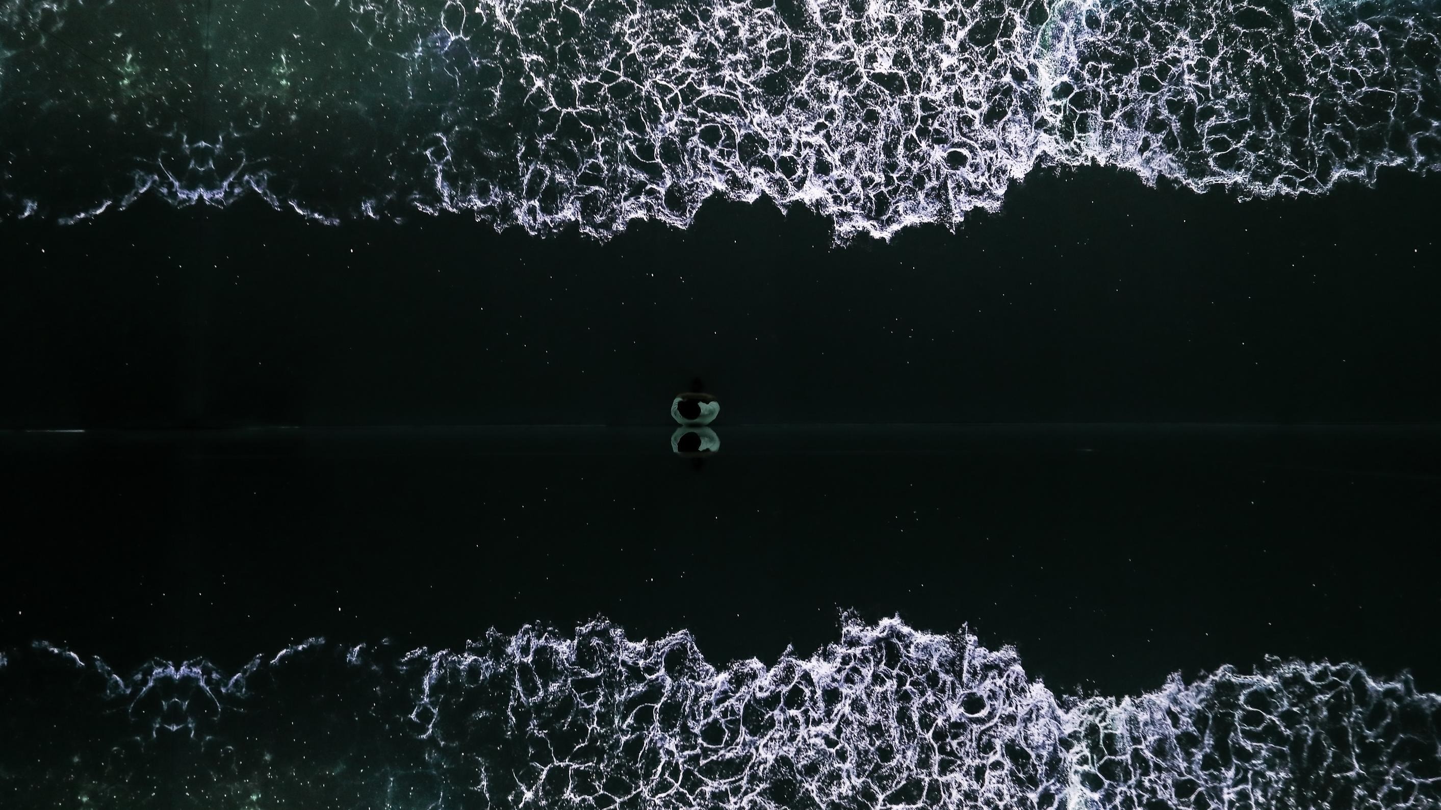 Arte Museum Dubai interior with digital wave projection.