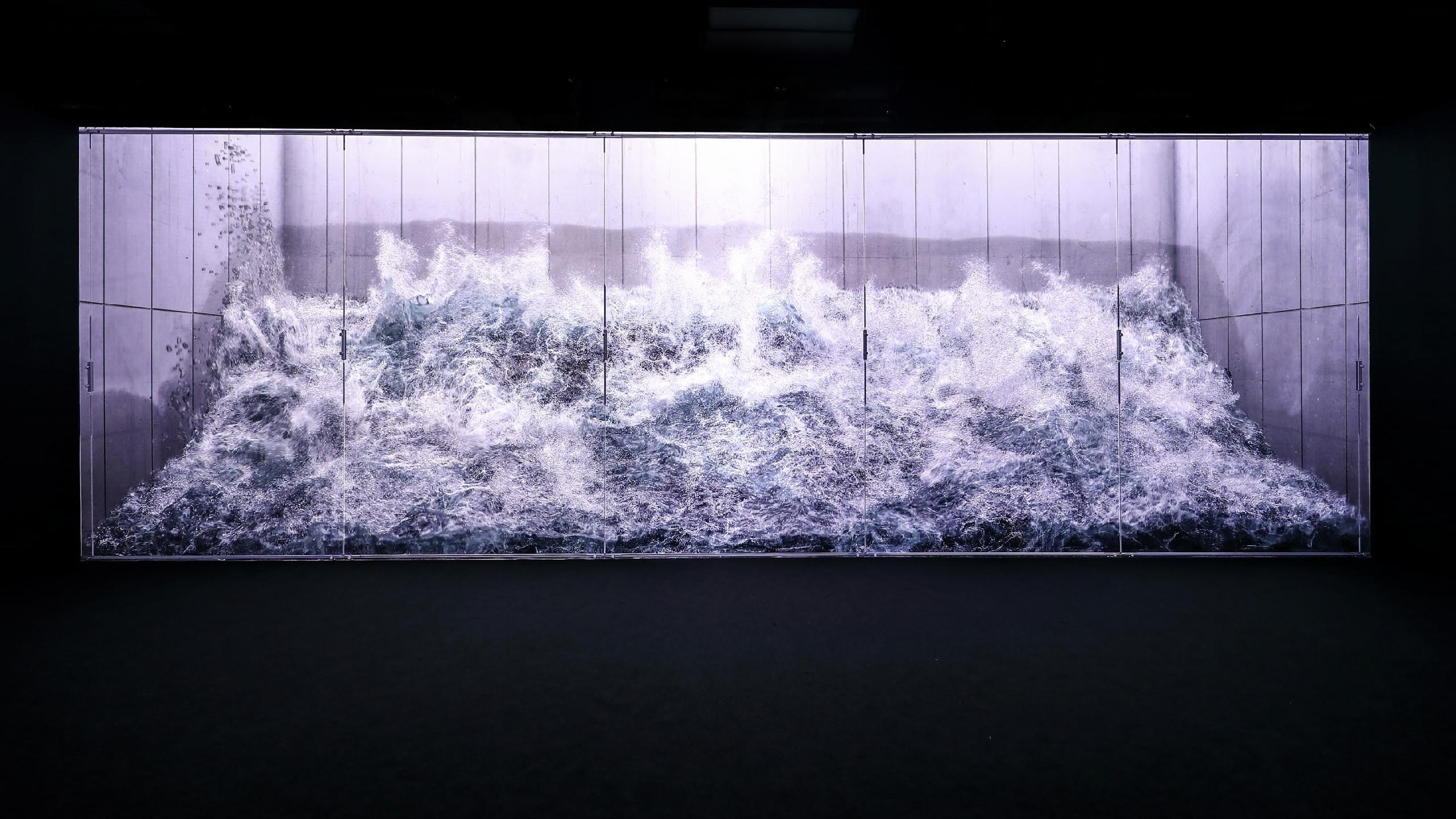 Arte Museum Dubai interior with dynamic wave projection display.