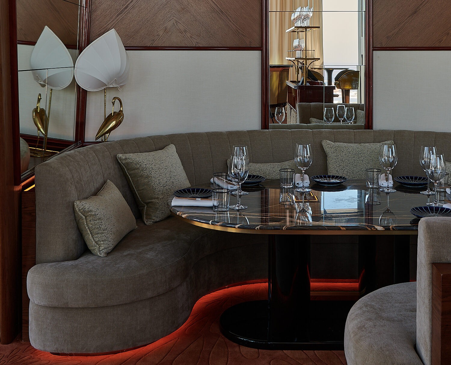 Elegant dining setup at Bar des Pres Dubai, luxurious interior design.