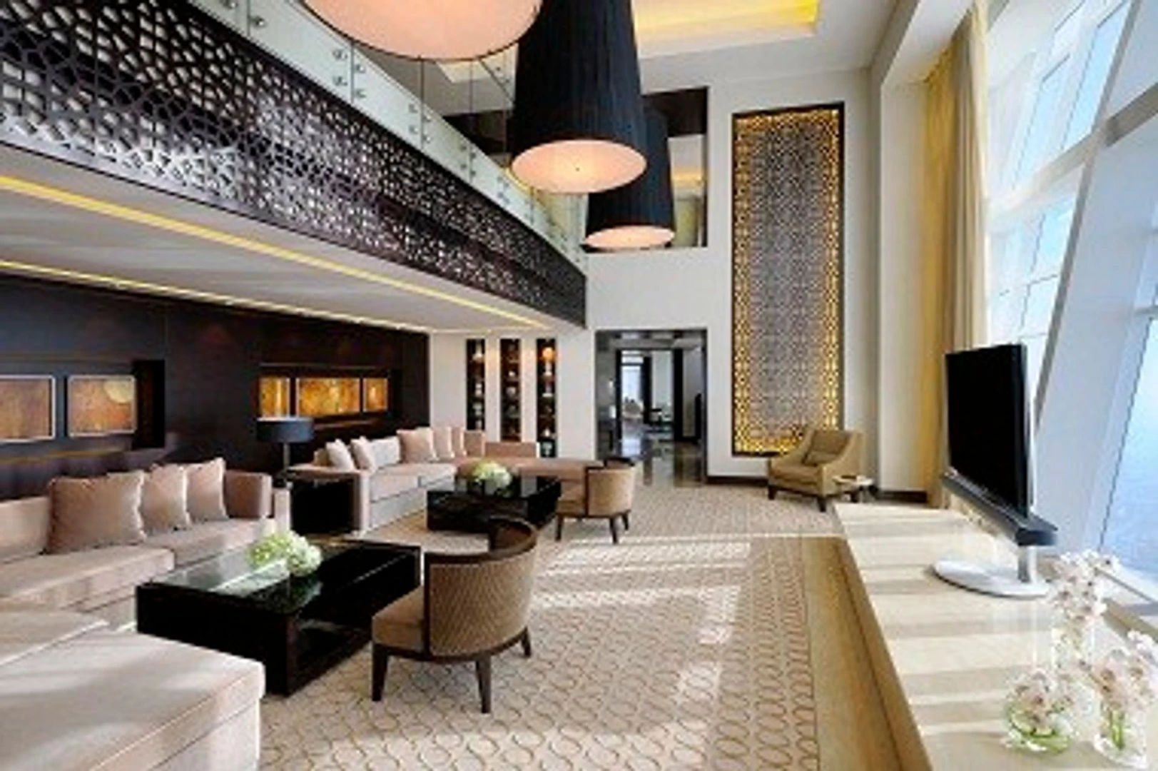 Luxurious lounge at JW Marriott Marquis Hotel Dubai, elegant decor.