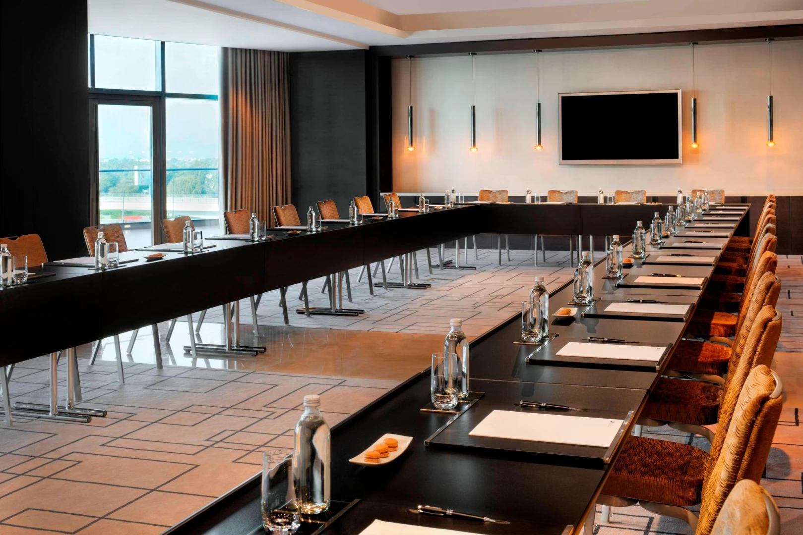Conference room at JW Marriott Marquis Hotel Dubai, set for meeting.
