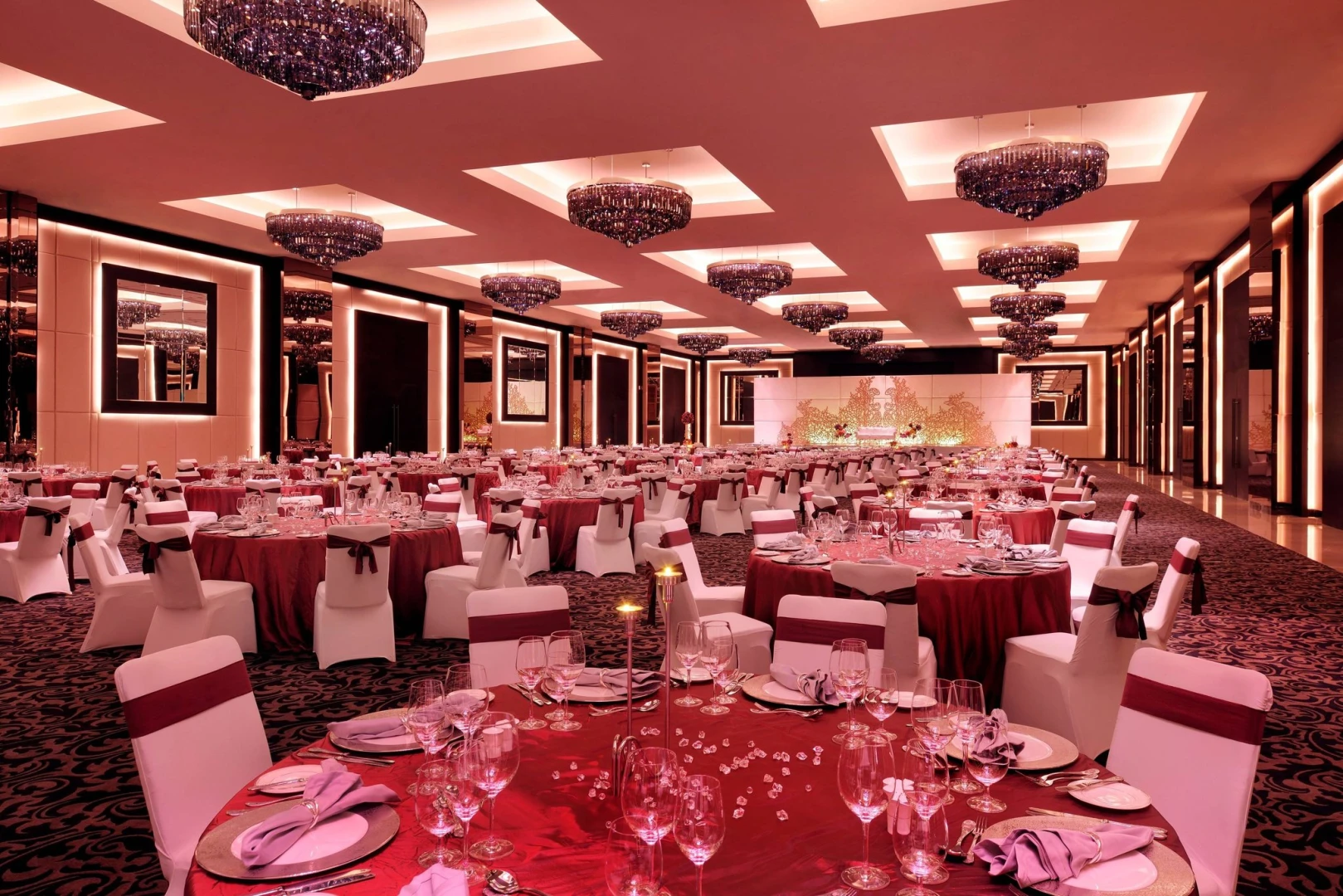 Lavish banquet setup with chandeliers, JW Marriott Marquis Dubai.