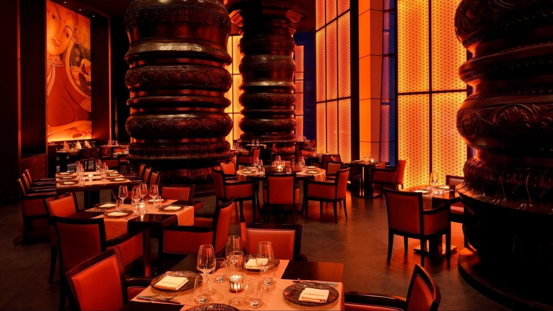 Elegant dining area at JW Marriott Marquis Hotel Dubai, warm lighting.