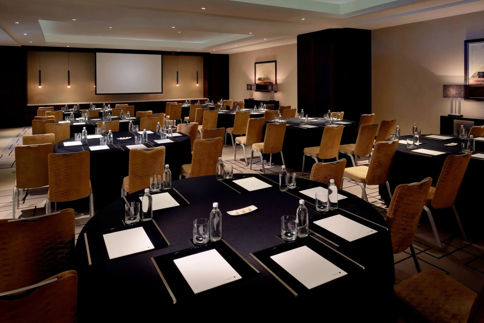 Meeting room with round tables, JW Marriott Marquis Dubai.