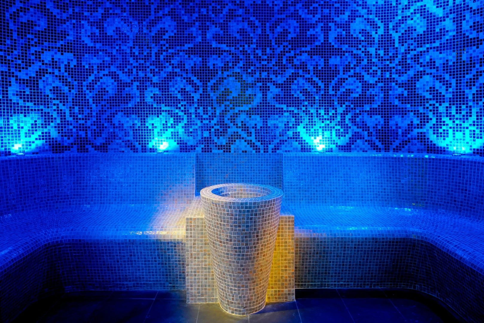 Luxurious blue mosaic steam room at JW Marriott Marquis Dubai.