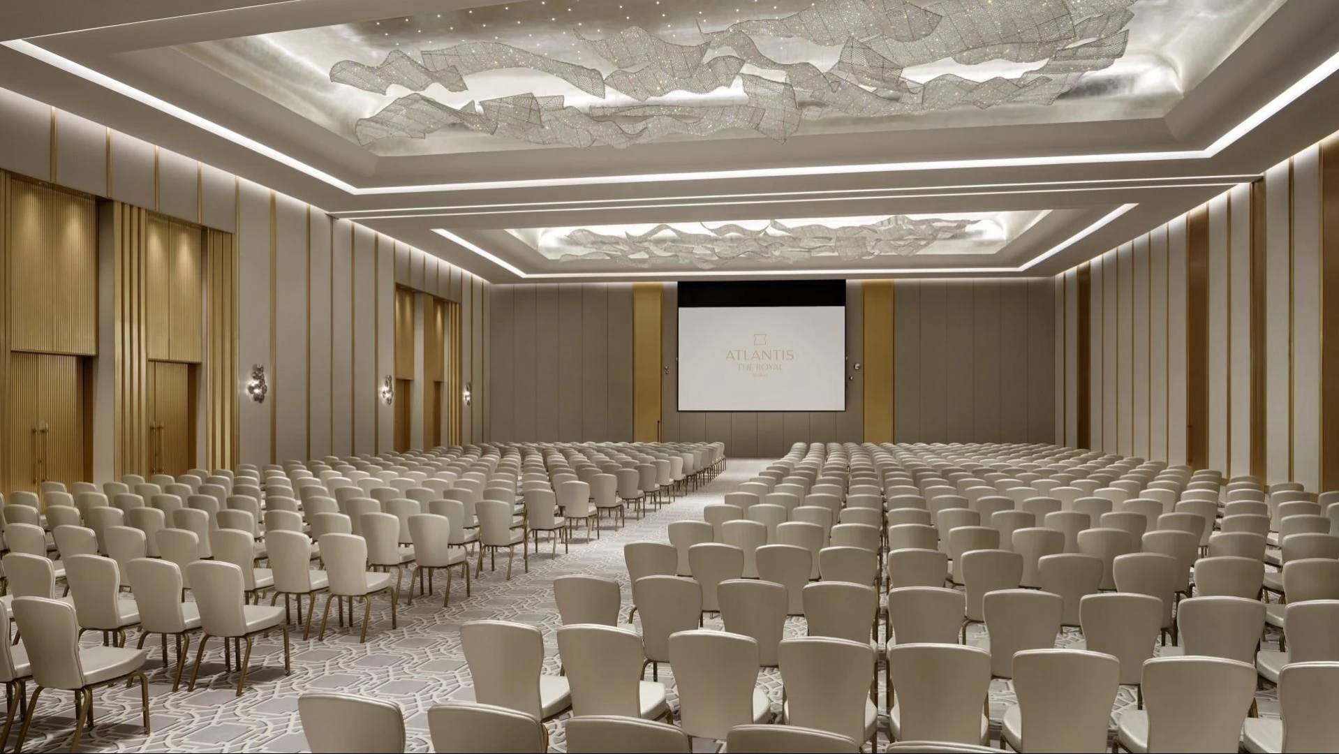 Elegant conference room at Atlantis The Royal, Dubai, with rows of chairs.