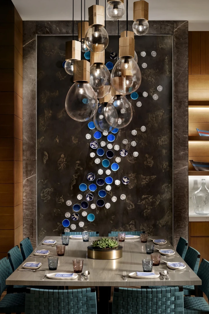 Elegant dining area at Atlantis The Royal, Dubai with artistic decor.