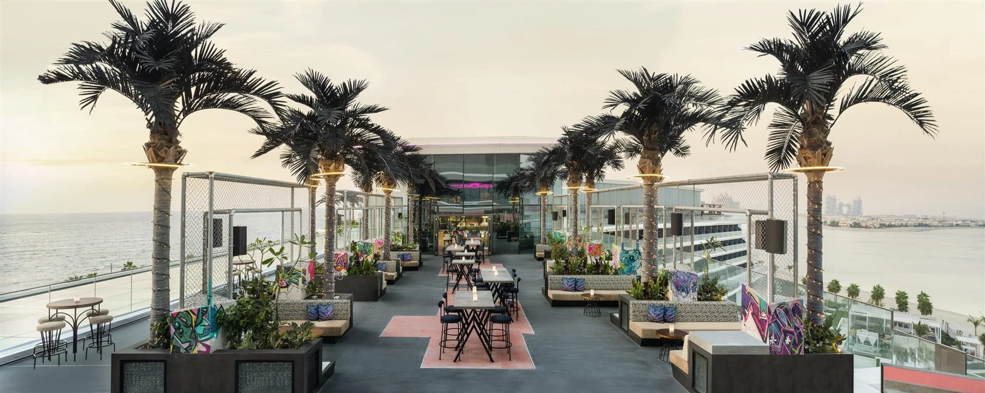 Rooftop terrace at W Dubai - The Palm, overlooking the sea.