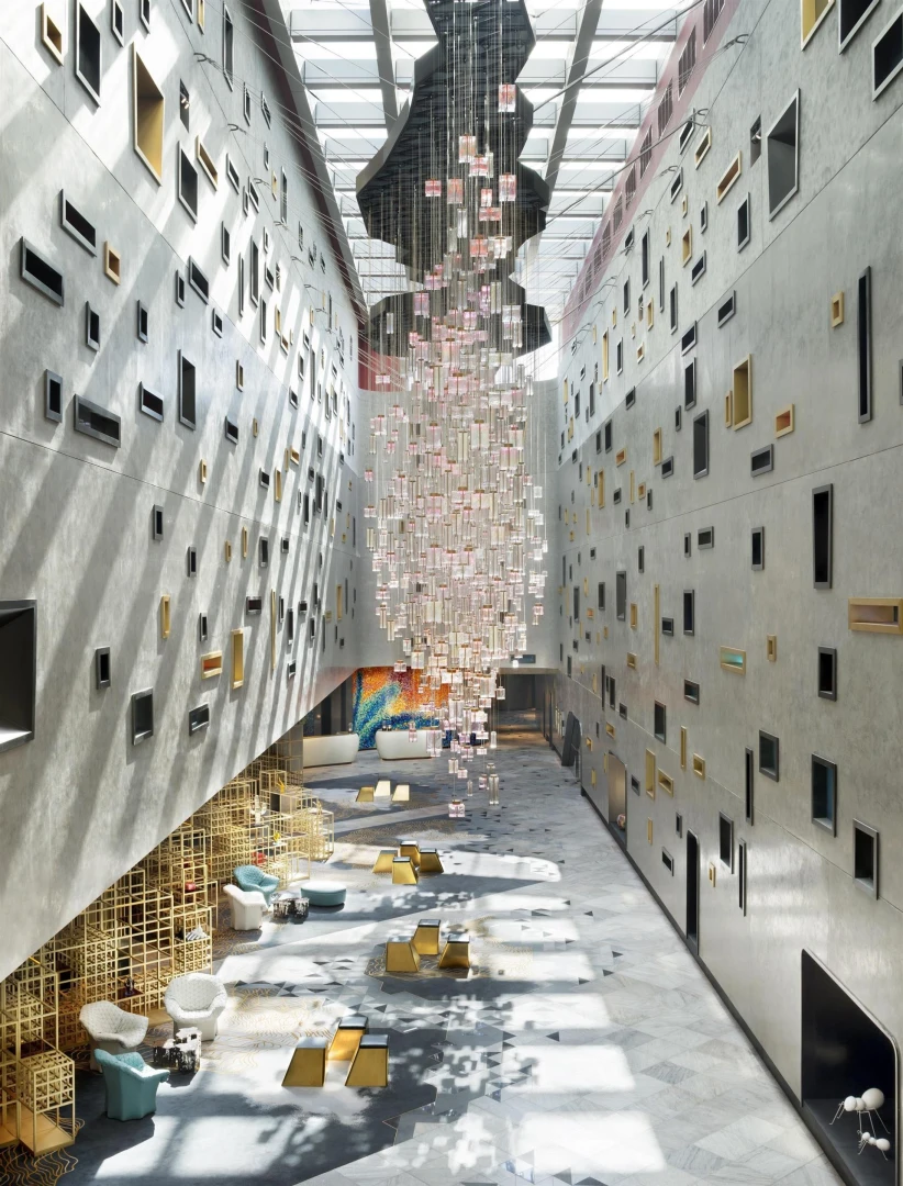 Modern atrium with artistic chandelier at W Dubai - The Palm.