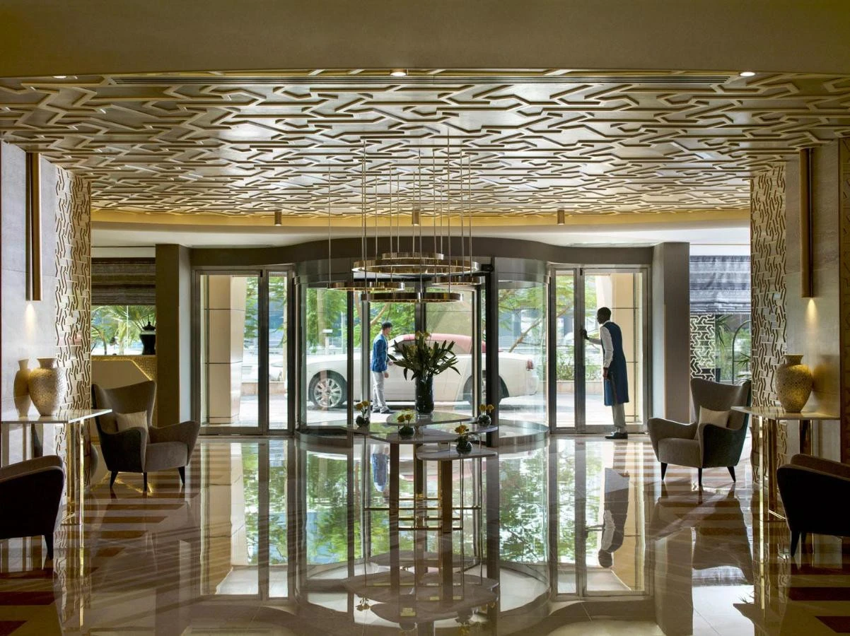 Spacious and elegant lobby area of Two Seasons Hotel & Apartments Dubai with modern furnishings.