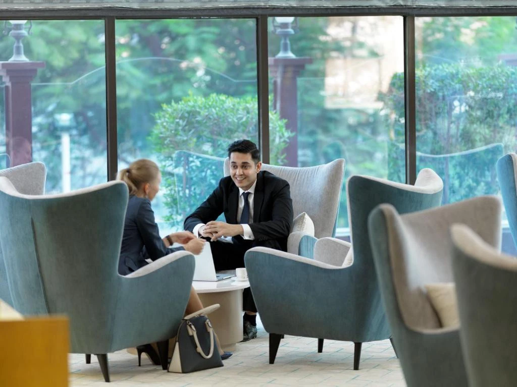 Business meeting in Two Seasons Hotel lounge, Dubai.