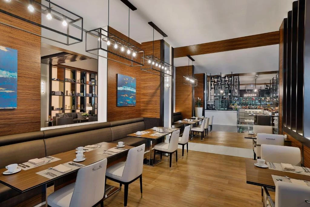 Elegant dining area at Hilton Dubai Palm Jumeirah, modern decor.