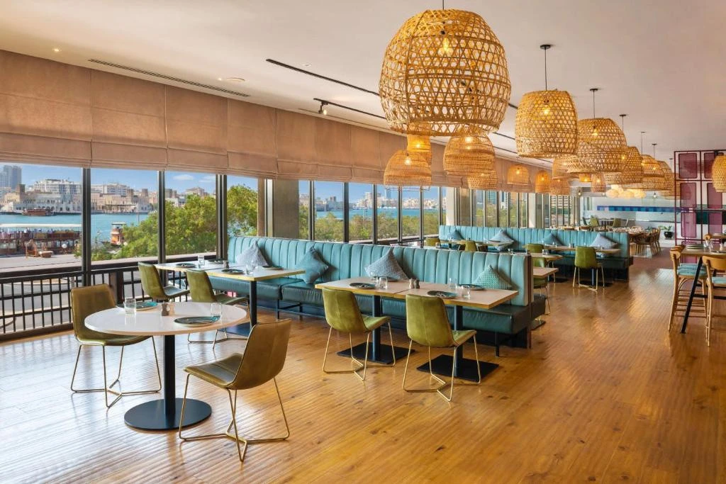 Spacious dining area at Radisson Blu Hotel, Dubai Deira Creek.