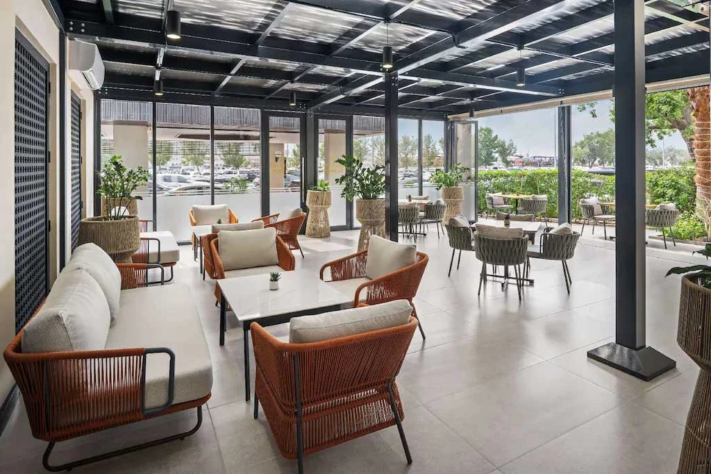 Outdoor seating area at Radisson Blu Hotel, Dubai Deira Creek.