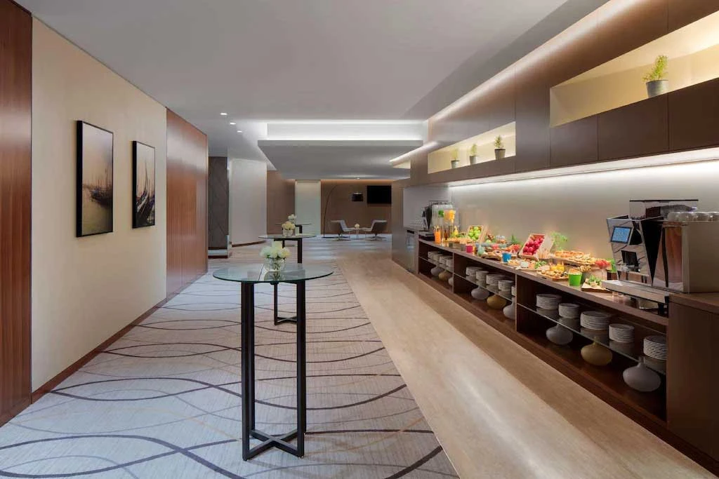 Radisson Blu Hotel Dubai Deira Creek buffet area with modern decor.