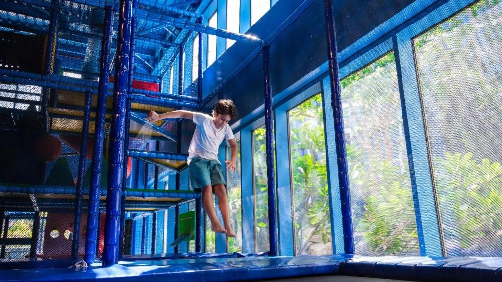 Child playing in indoor playground, Jumeirah Beach Hotel, Dubai.