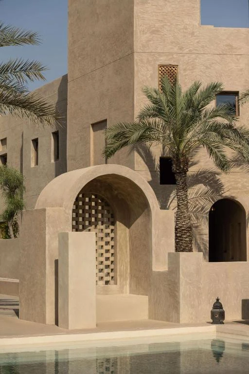 Bab Al Shams Desert Resort entrance with palm tree, Dubai.