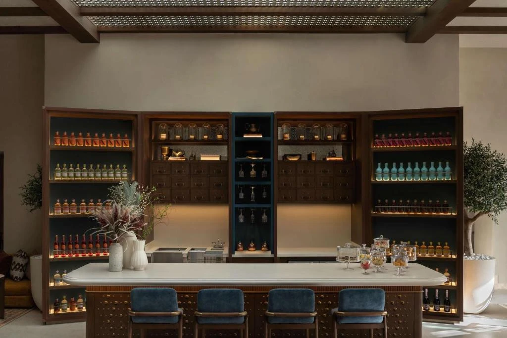 Elegant bar with shelves of bottles, Bab Al Shams, Dubai.