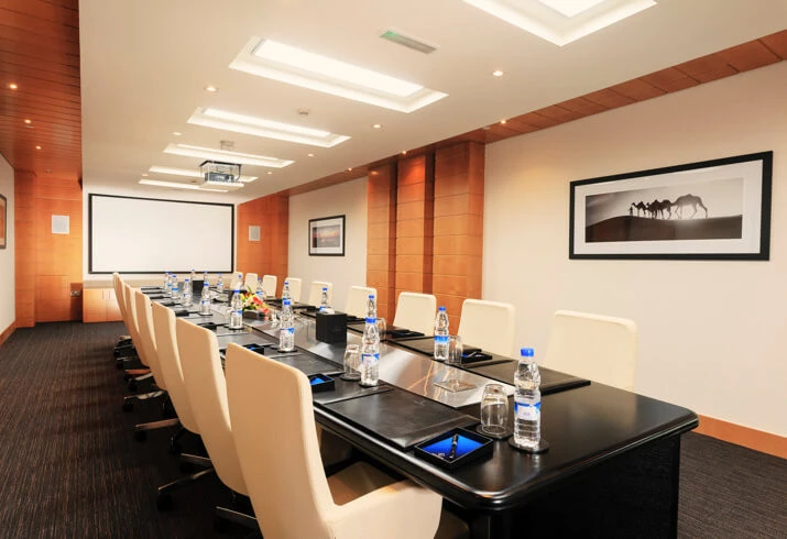 Conference room at Dubai World Trade Centre with long table and chairs.