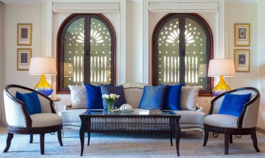 Luxurious lounge with blue cushions at One&Only Royal Mirage, Dubai.