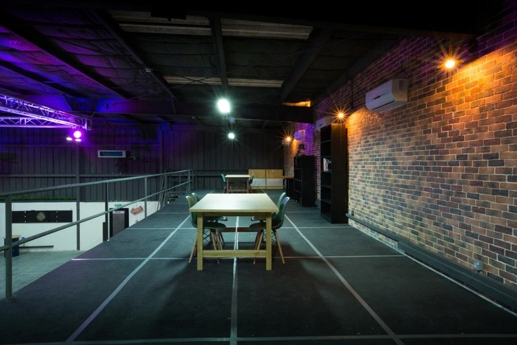 Industrial loft space at Warehouse Four, Dubai with brick walls.
