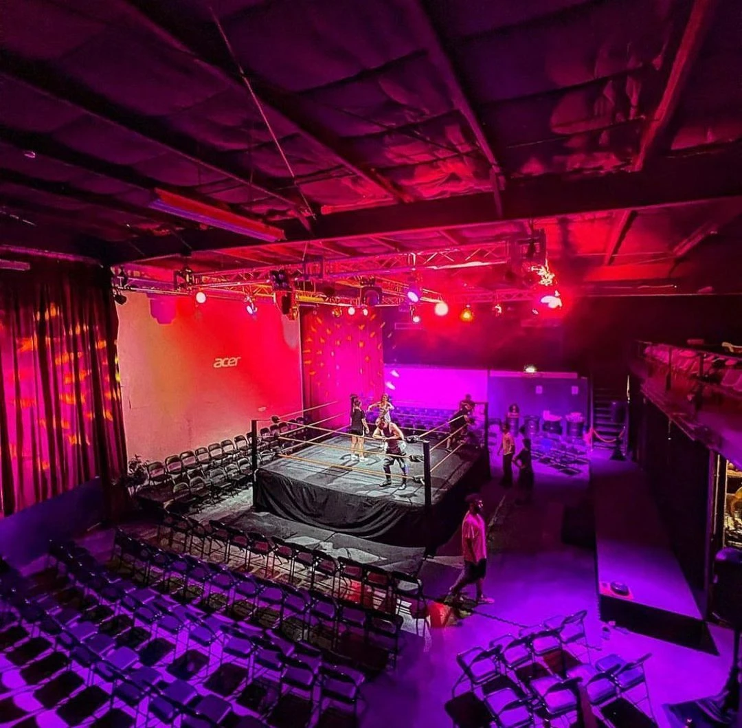 Wrestling ring with audience seating at Warehouse Four, Dubai.