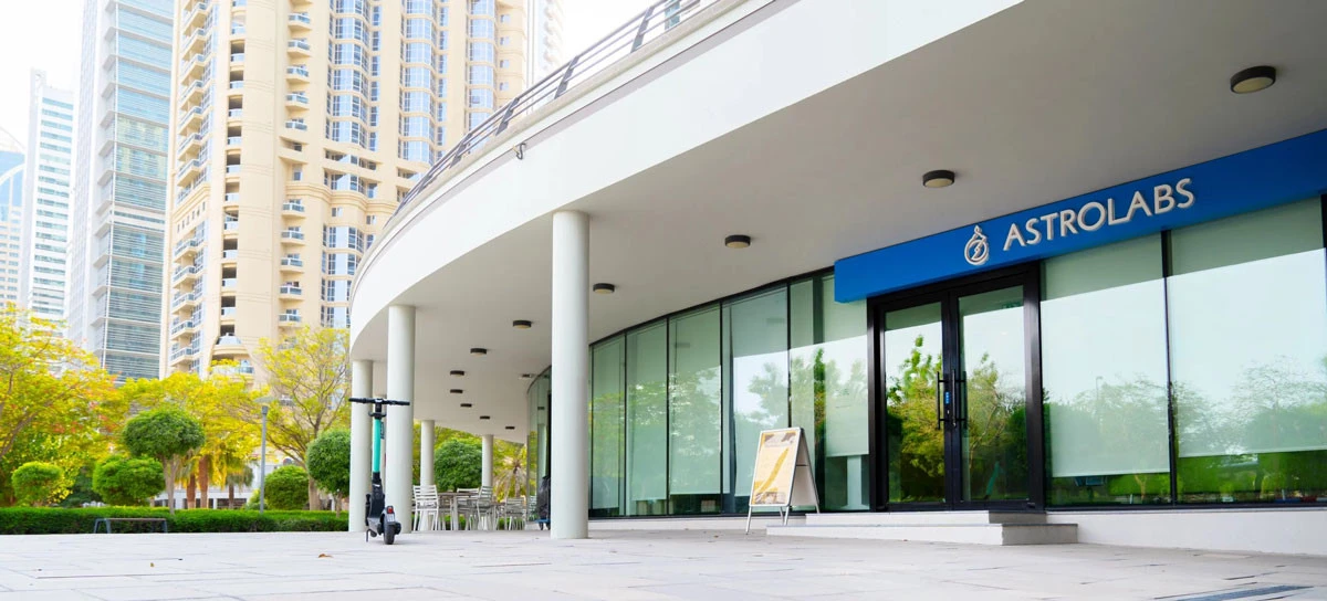 AstroLabs Coworking Space entrance with skyscrapers, Dubai.