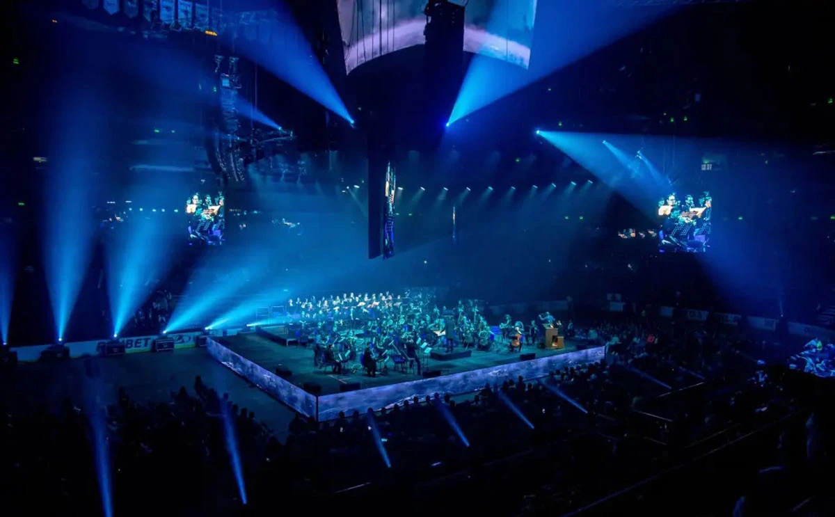 Concert with blue lights at Coca-Cola Arena, Dubai.