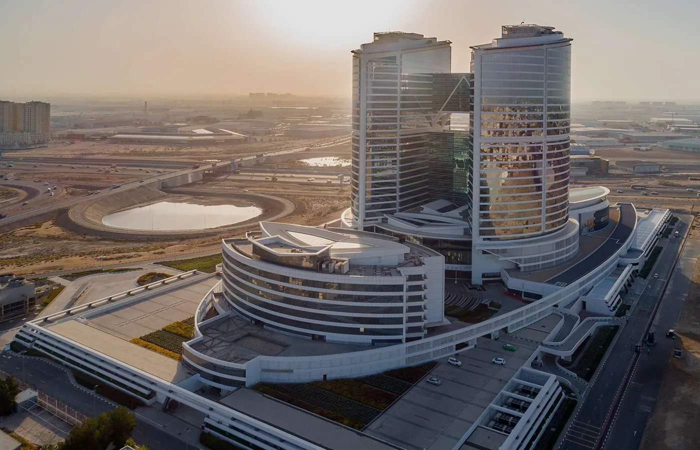 Jafza One Convention Centre, modern architecture, Dubai skyline at sunset.
