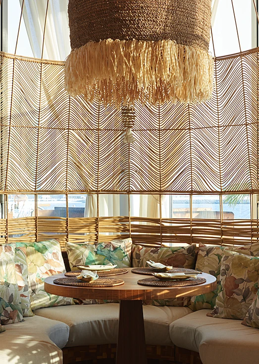Cozy seating area at Koko Bay, Dubai with woven decor.