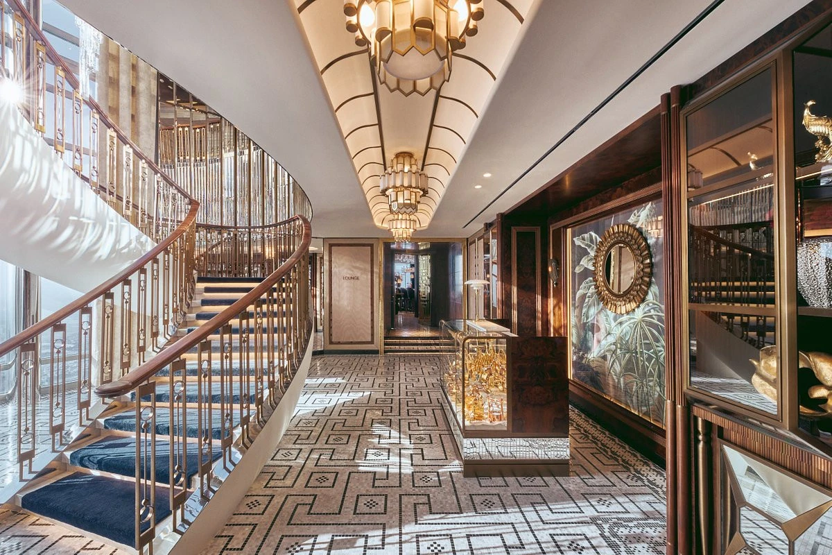 Elegant interior of Atmosphere Burj Khalifa, Dubai with spiral staircase.