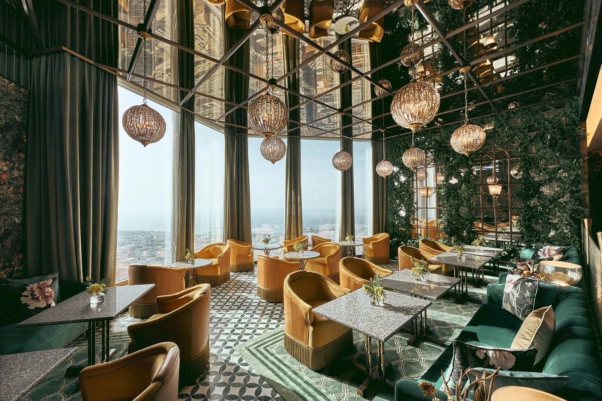 Elegant dining area at Atmosphere Burj Khalifa, Dubai with city view.