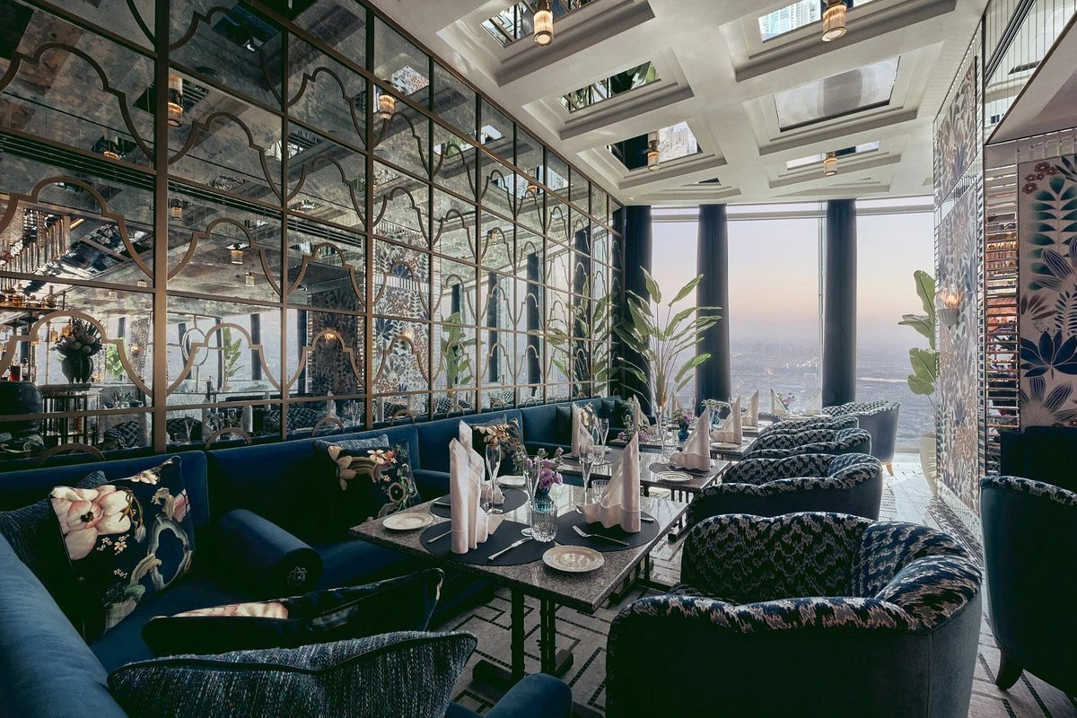 Chic dining space at Atmosphere Burj Khalifa with panoramic city views.