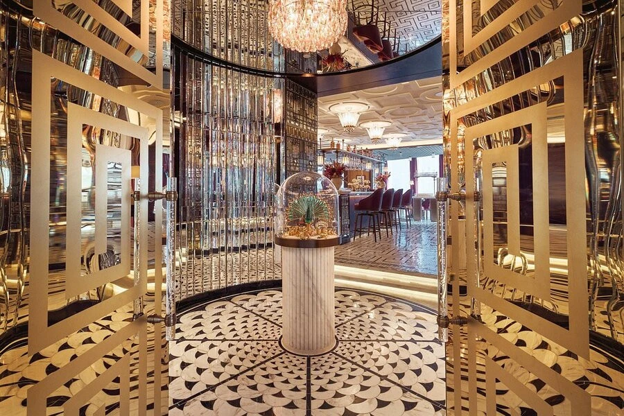 Luxurious interior of Atmosphere Burj Khalifa, Dubai with ornate decor.