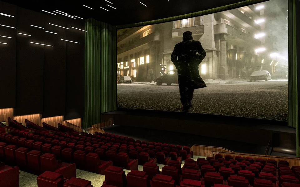 Roxy Cinema Dubai Hills auditorium with large screen and red seats.