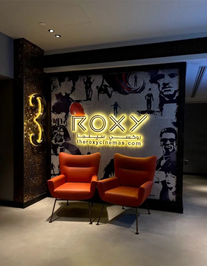Roxy Cinema Box Park lobby with orange chairs, Dubai.