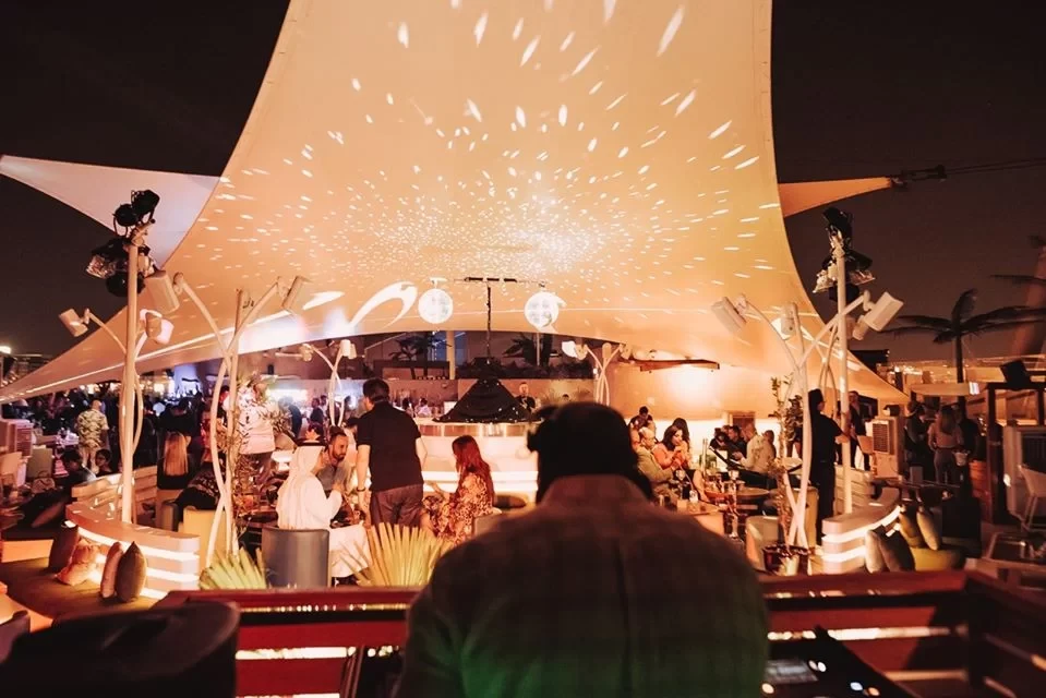 Evening event at Dubai Creek Golf & Yacht Club, vibrant atmosphere.
