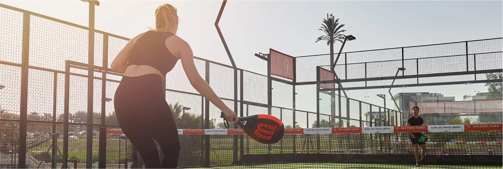 People playing padel at Dubai Creek Golf & Yacht Club.