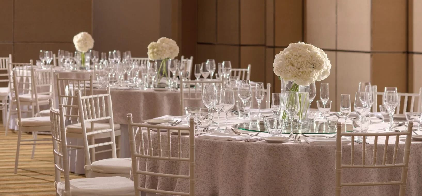 Elegant banquet setup at Dubai Creek Golf & Yacht Club.