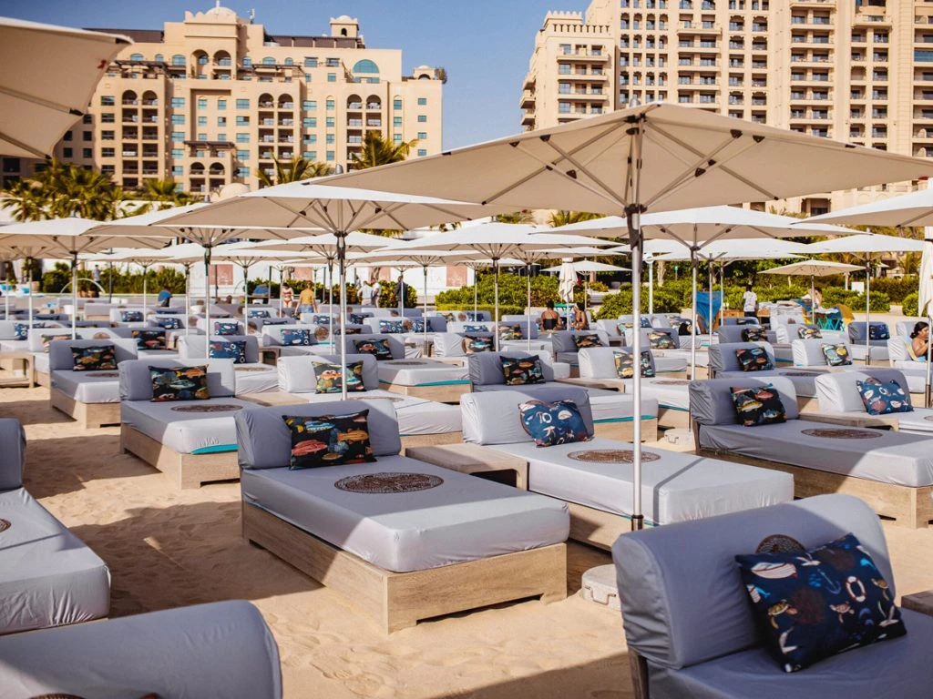 Outdoor lounge area with sunbeds at Gallery 7/40 Dubai.