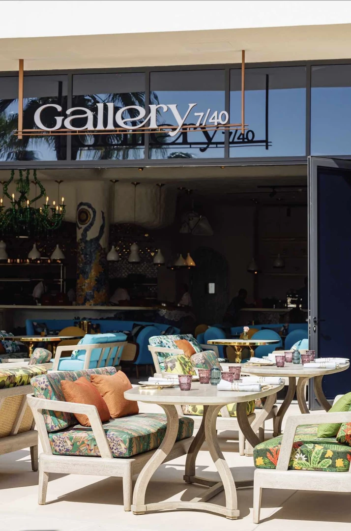 Outdoor seating at Gallery 7/40 Dubai with colorful cushions.