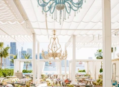 Elegant outdoor seating at Gallery 7/40 Dubai with city skyline view.