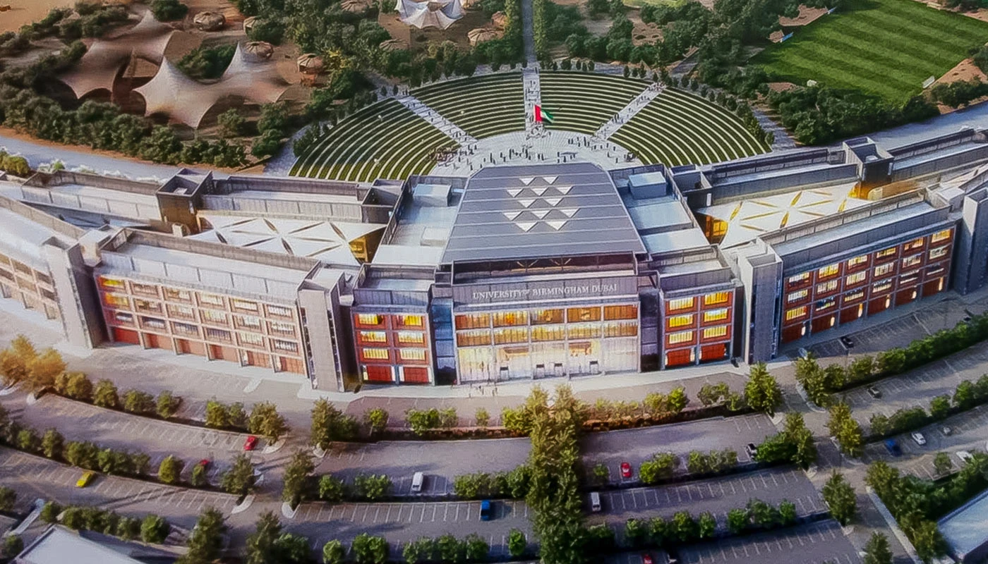 Aerial view of University of Birmingham Dubai campus with amphitheater.