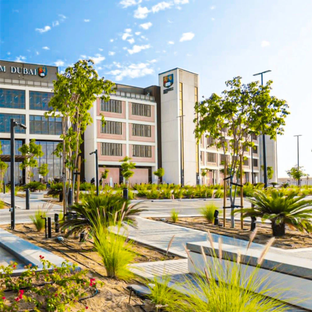 University of Birmingham Dubai campus with modern architecture and landscaping.